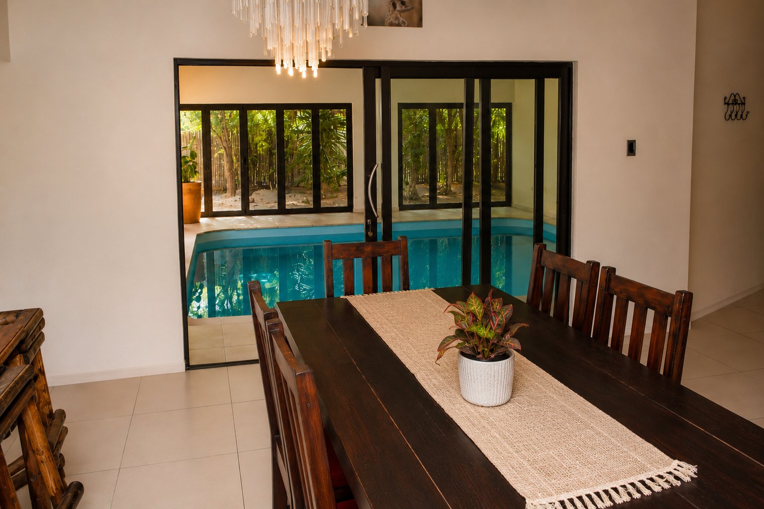 Dining room with indoor pool view at Meerkat Manor Guesthouse